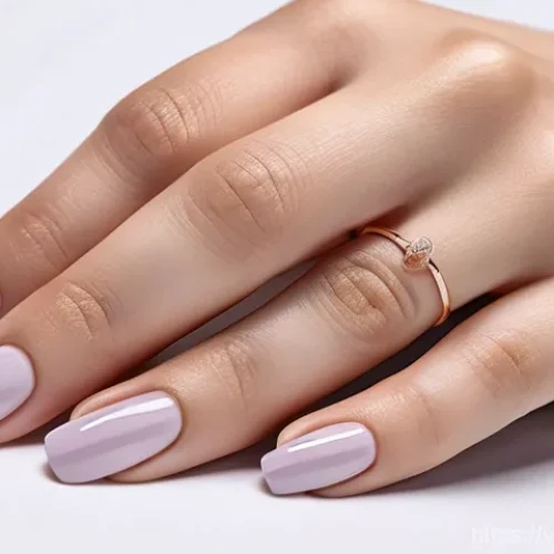 Home 31 기타 손톱 관리 - A close-up of a Vietnamese woman's elegant hands, showcasing perfectly manicured, short, almond-shap...