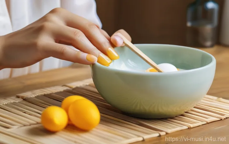 기타 손톱 관리 - A close-up of a Vietnamese woman's elegant hands, showcasing perfectly manicured, short, almond-shap...