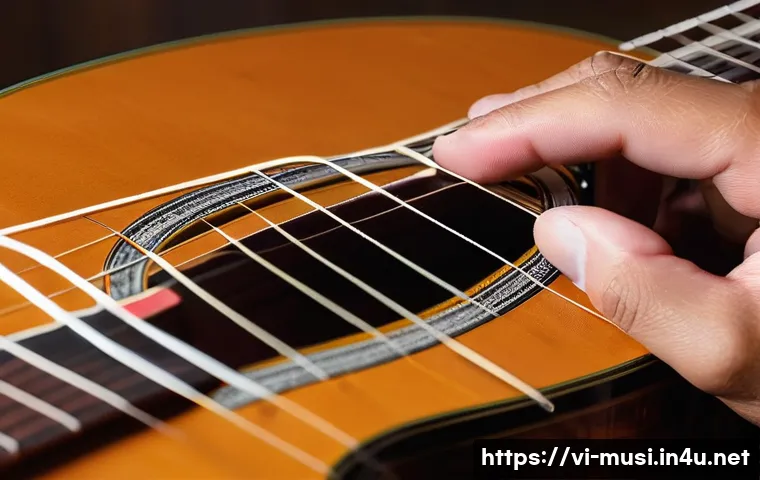 기타 줄 감는 방법 - A detailed close-up image of a person changing guitar strings on a classical guitar with nylon strin...